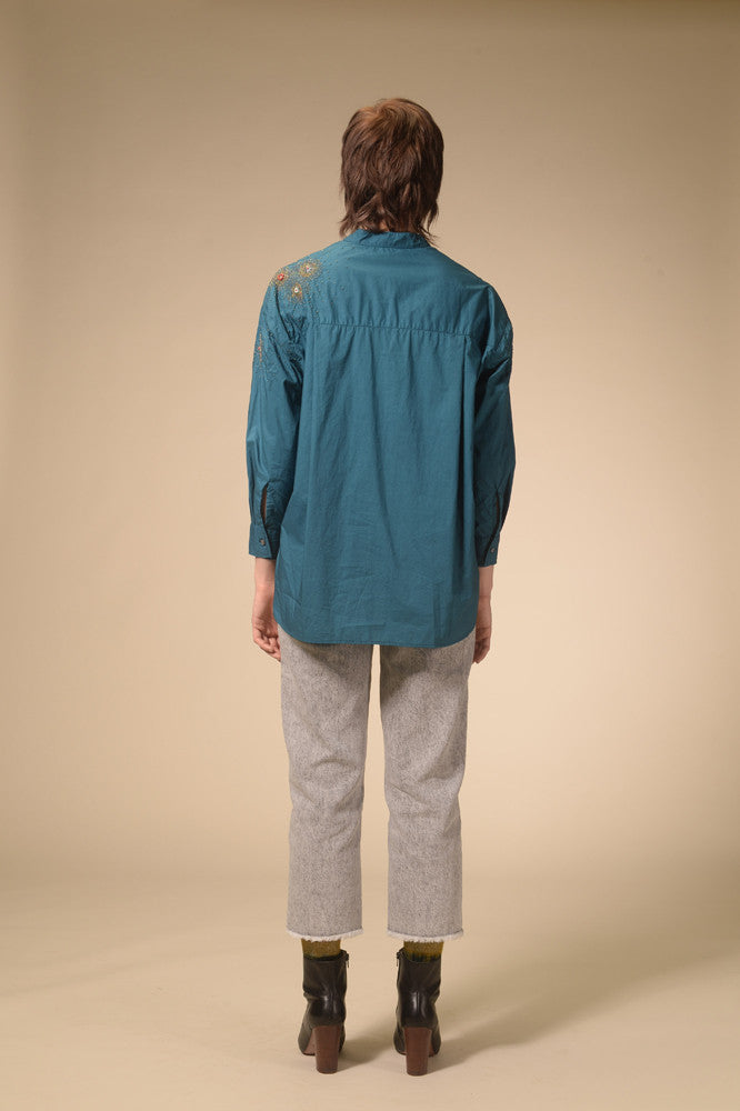 Star-studded teal blue shirt