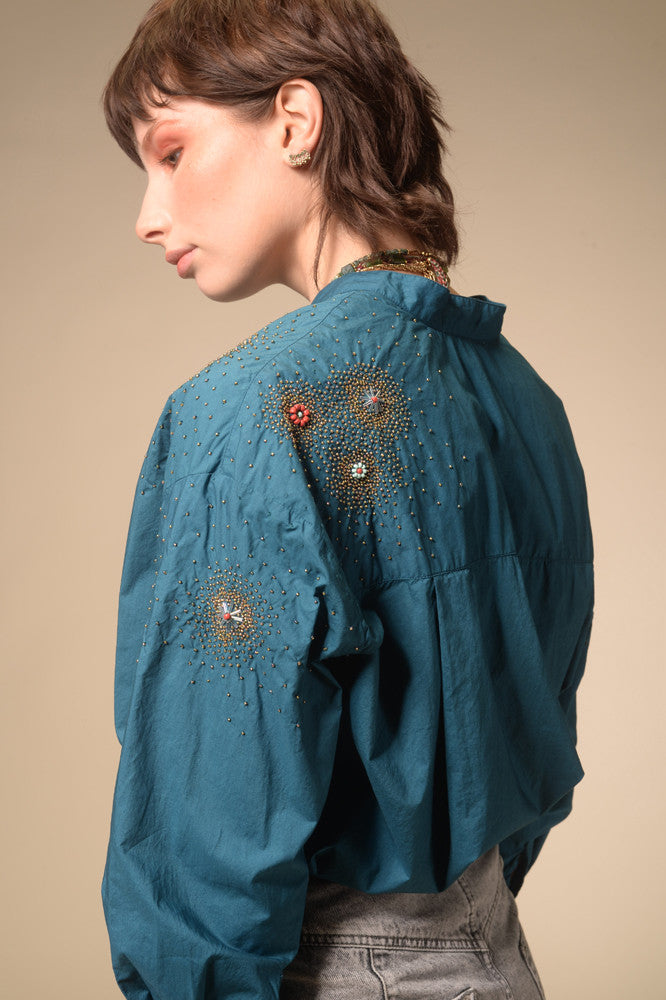 Star-studded teal blue shirt