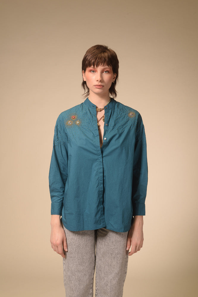 Star-studded teal blue shirt